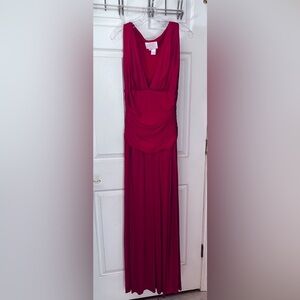 Marc Bouwer Glamit size 4 long jersey evening gown. Side zipper with deep Vneck.